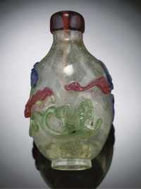 18th Century A three-colour overlay bubble suffused glass bottle
